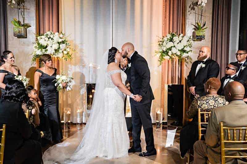Moneca and Randall Wedding Kiss