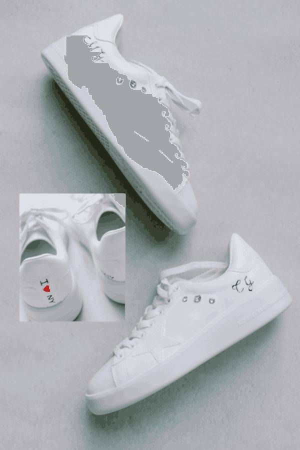 Custom shoes adorned with Carolina and Matthews initials on the side and I heart NY on the heel.